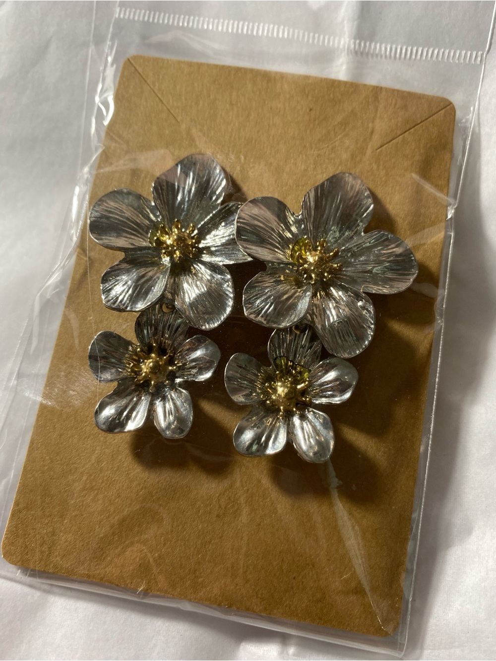 Double Floral Drop Earrings in Silver with Gold Centers